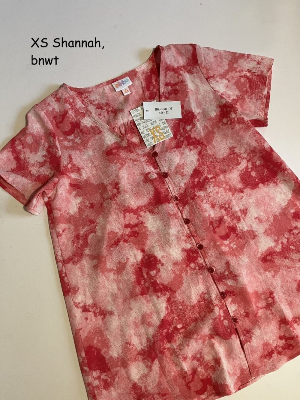 XS Lularoe Shannah button down top, pink tie-dye